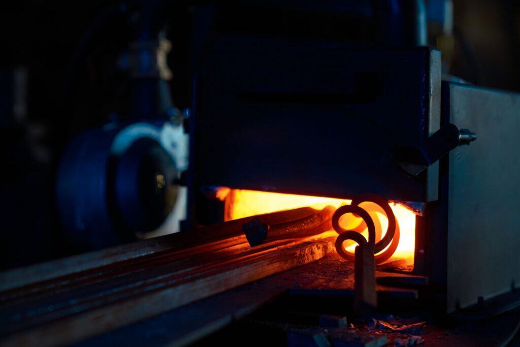 Heat resistant stainless steel components heating inside an industrial forge furnace
