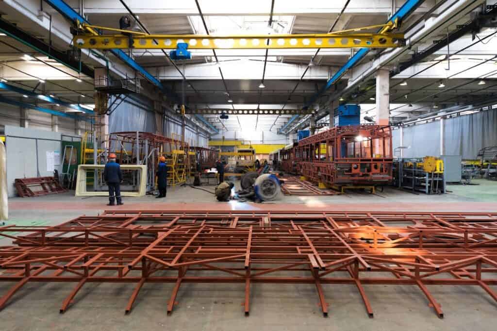 Heat resistant stainless steel frames being fabricated in an industrial factory for high-temperature vehicle applications.
